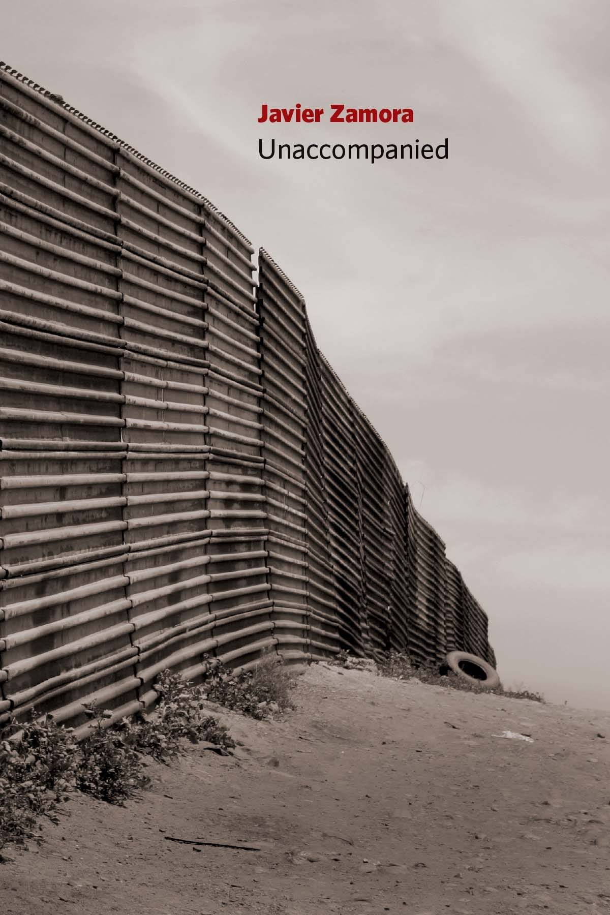 "unaccompanied" book cover with a black and white photo of a tall wall going into the distance